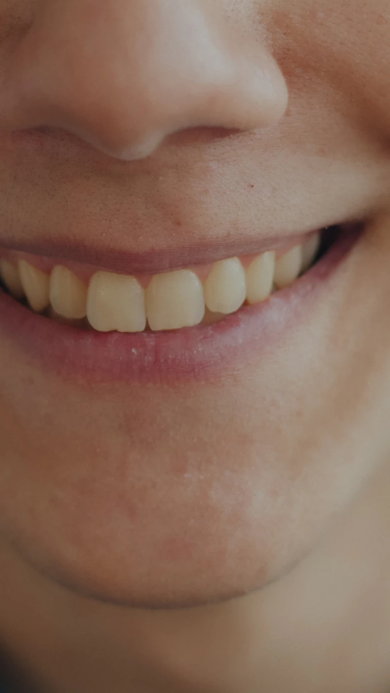 A close-up of a man's smile